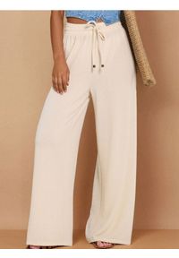 Sinsay - Spodnie wide leg - beżowy. Kolor: beżowy
