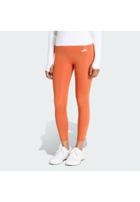 Adidas - Legginsy 7/8 bez szwu z przodu Optime Essentials. Kolor: pomarańczowy. Technologia: ClimaCool (Adidas). Wzór: gładki. Sport: fitness #1
