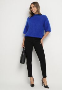 Born2be - Czarne Spodnie o Kroju Skinny z Regularnym Stanem Mendria. Okazja: na co dzień. Kolor: czarny. Styl: klasyczny, casual, elegancki