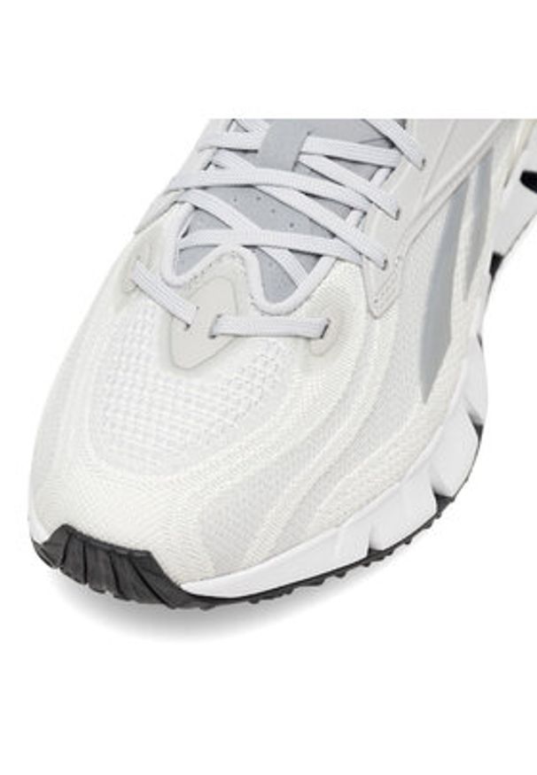 Reebok Sneakersy Zig Kinetica 3 100034218 W Szary. Kolor: szary. Materiał: materiał