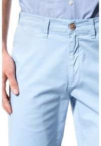 Wrangler - KRÓTKIE SPODENKI WRANGLER CHINO SHORT LIGHT BLUE W14AMM25N 112126569. Materiał: materiał. Długość: krótkie. Wzór: jednolity, aplikacja #3