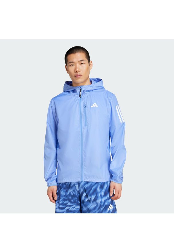 Adidas - Kurtka Own The Run. Kolor: niebieski. Sport: bieganie