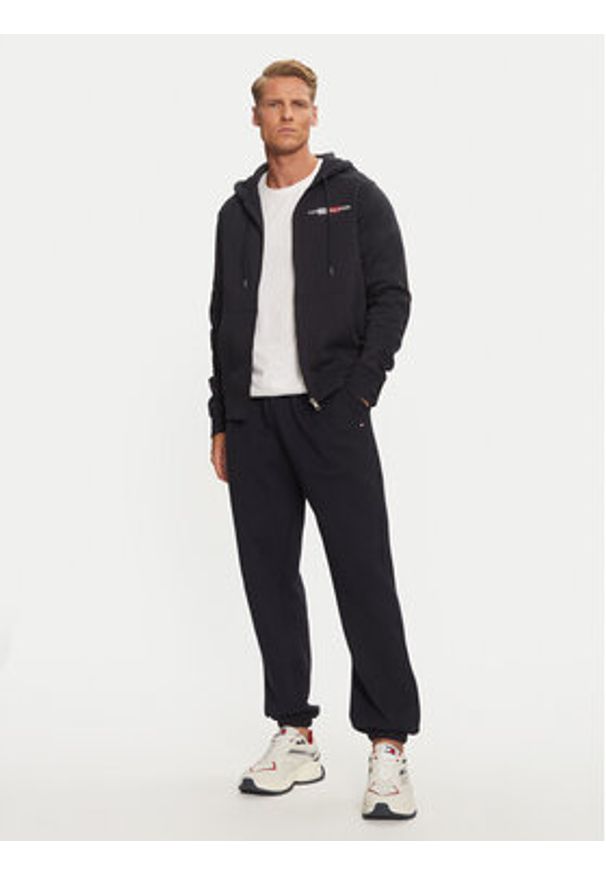 TOMMY HILFIGER - Tommy Hilfiger Spodnie dresowe Essential MW0MW37231 Granatowy Relaxed Fit. Kolor: niebieski. Materiał: syntetyk, bawełna