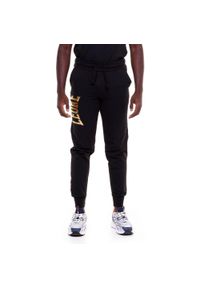 LEONE 1947 APPAREL - Męskie spodnie dresowe w kolorze złotym. Kolor: czarny. Materiał: dresówka. Sport: fitness #1