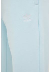 adidas Originals spodnie dresowe damskie gładkie. Kolor: niebieski. Materiał: dresówka. Wzór: gładki #4