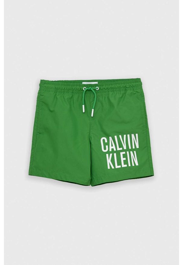 Calvin Klein Jeans szorty kąpielowe dziecięce kolor zielony. Kolor: zielony. Materiał: poliester, materiał. Wzór: nadruk