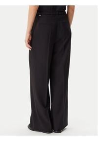 Calvin Klein Spodnie materiałowe Travel Twill K20K208214 Czarny Wide Leg. Kolor: czarny. Materiał: syntetyk