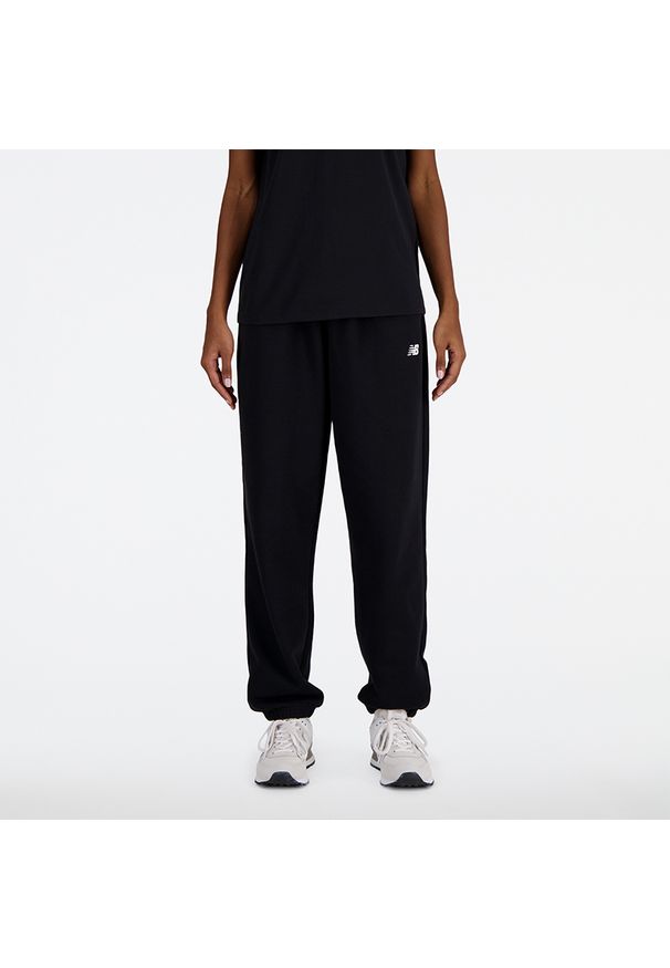 Spodnie damskie New Balance WP41500BK – czarne. Stan: podwyższony. Kolor: czarny. Materiał: bawełna, dresówka, poliester