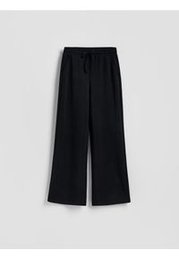 Reserved - Spodnie z szeroką nogawką - czarny. Kolor: czarny. Materiał: dzianina #1