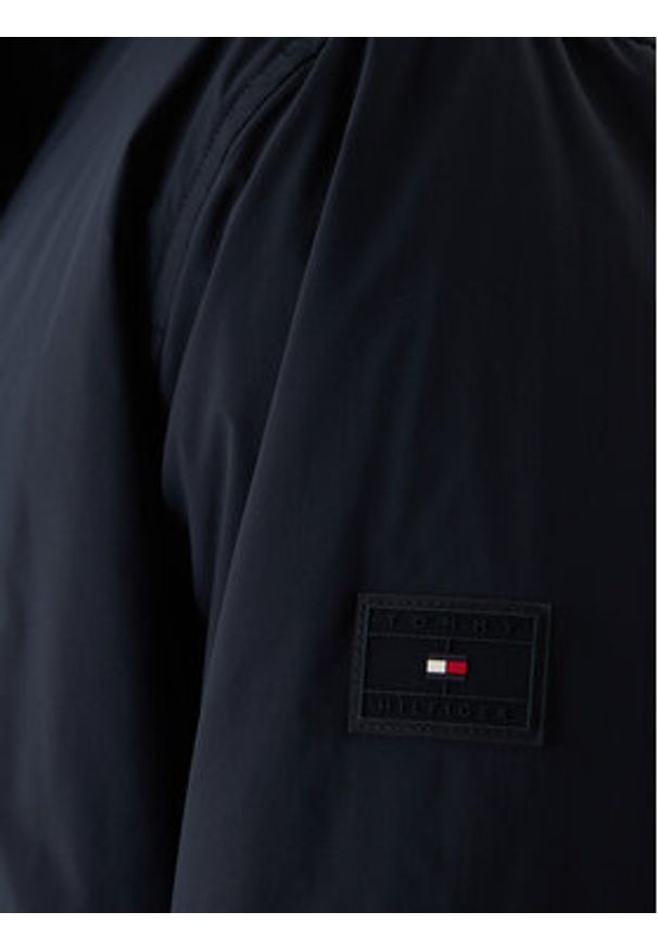 TOMMY HILFIGER - Tommy Hilfiger Kurtka przejściowa MW0MW42563 Granatowy Regular Fit. Kolor: niebieski. Materiał: syntetyk