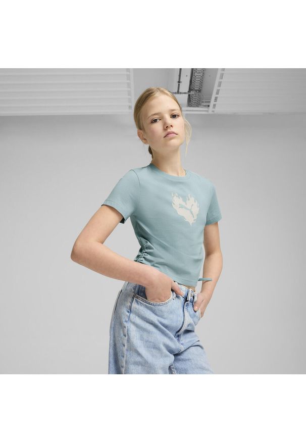 Puma - Młodzieżowa koszulka FLAMING LOVE z węzłem PUMA Modern Mint Green. Kolor: zielony. Materiał: guma, prążkowany. Wzór: nadruk. Sport: joga i pilates