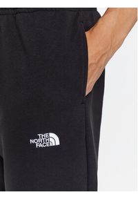 The North Face Spodnie dresowe Essential NF0A7ZJB Czarny Regular Fit. Kolor: czarny. Materiał: bawełna #5