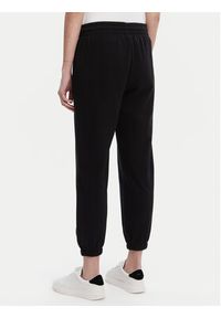 GAP - Gap Spodnie dresowe 889527-00 Czarny Relaxed Fit. Kolor: czarny. Materiał: bawełna