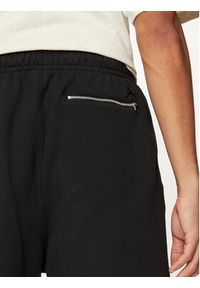 Nike Szorty sportowe FJ0700 Czarny Regular Fit. Kolor: czarny. Materiał: bawełna. Styl: sportowy