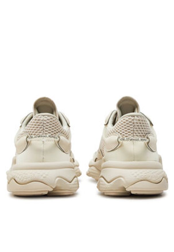 Adidas - adidas Sneakersy Ozweego J IG9016 Beżowy. Kolor: beżowy. Materiał: materiał