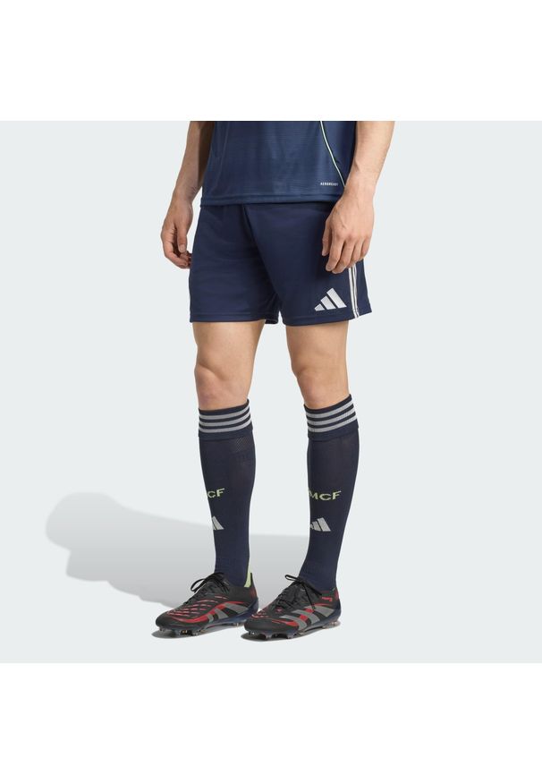 Adidas - Wyjazdowe szorty Real Madryt 25/26. Kolor: wielokolorowy, niebieski, szary. Sport: piłka nożna
