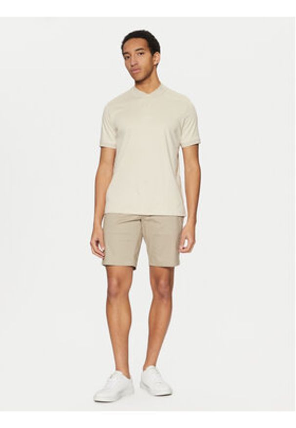 Calvin Klein Polo K10K111201 Beżowy Regular Fit. Typ kołnierza: polo. Kolor: beżowy. Materiał: bawełna