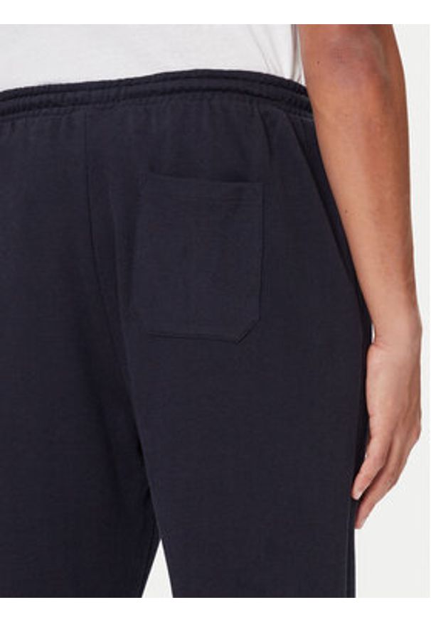TOMMY HILFIGER - Tommy Hilfiger Spodnie dresowe UM0UM03627 Niebieski Regular Fit. Kolor: niebieski. Materiał: bawełna
