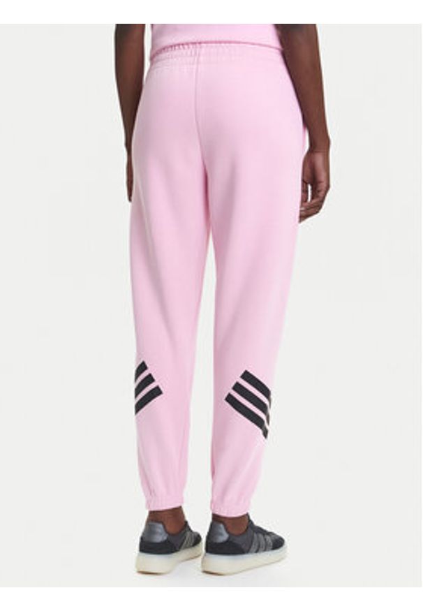 Adidas - adidas Spodnie dresowe Future Icons 3-Stripes JE0158 Różowy Regular Fit. Kolor: różowy. Materiał: bawełna