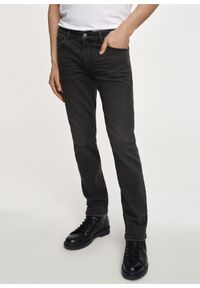Ochnik - Czarne spodnie jeansowe męskie. Kolor: czarny. Materiał: bawełna