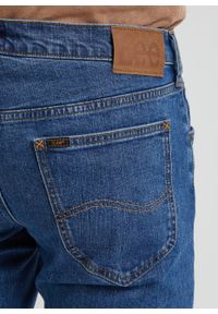 Lee - LEE DAREN ZIP FLY MĘSKIE SPODNIE JEANSOWE STONEAGE MID L707KND14 112338472