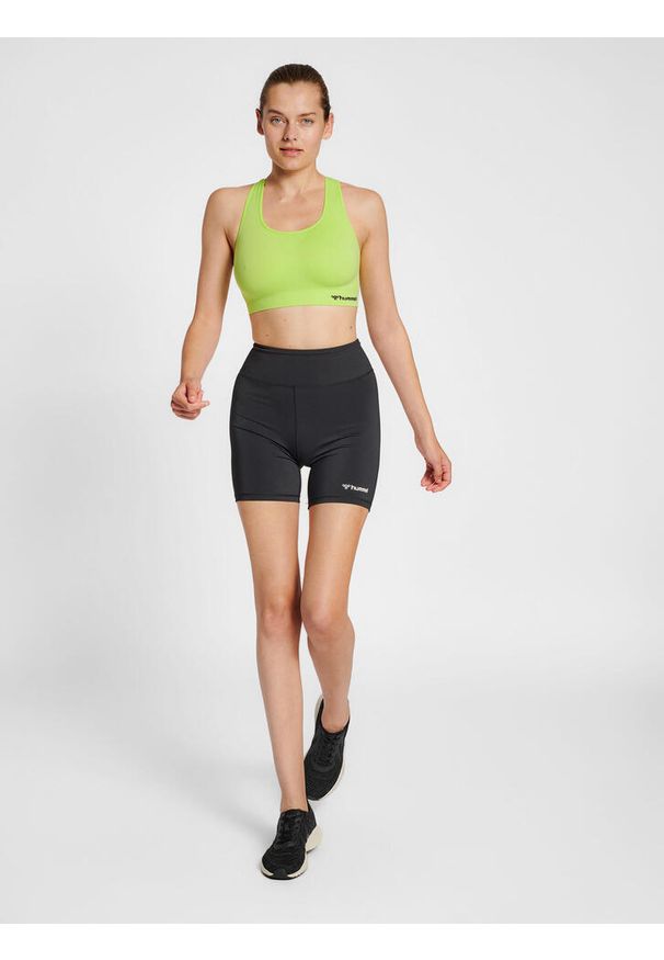Damski bezszwowy biustonosz sportowy Hummel Tif. Kolor: zielony, wielokolorowy, żółty. Sport: fitness