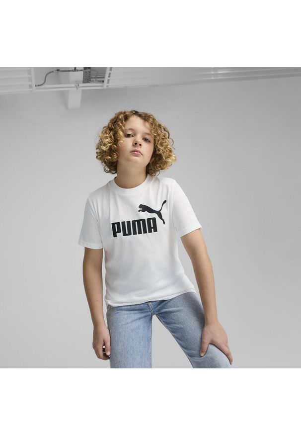 Puma - Młodzieżowa koszulka ESS z logo No. 1 PUMA. Kolor: biały. Materiał: guma. Wzór: nadruk. Sport: joga i pilates