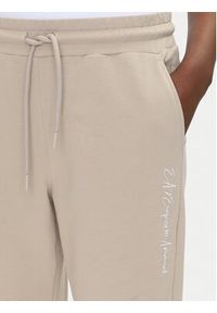 EA7 Emporio Armani Spodnie dresowe 7W000489 AF12951 U6155 Beżowy Regular Fit. Kolor: beżowy. Materiał: bawełna #3