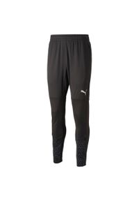 Jogging Puma Team Cup. Kolor: czarny. Materiał: materiał. Sport: bieganie #1