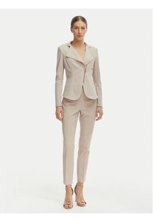 Rinascimento Spodnie materiałowe CFC0128650003 Beżowy Regular Fit. Kolor: beżowy. Materiał: syntetyk