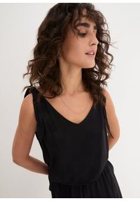 bonprix - Kombinezon z dżerseju ze zrównoważonej mieszanki wiskozy. Kolor: czarny. Materiał: jersey, wiskoza. Styl: elegancki