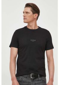 Guess t-shirt bawełniany kolor czarny z aplikacją. Kolor: czarny. Materiał: bawełna. Wzór: aplikacja. Styl: klasyczny #1