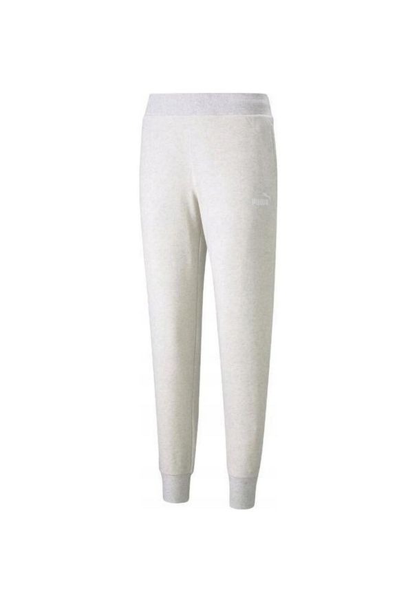 Puma - Spodnie Do Joggingu Damskie Logo Essential. Kolor: beżowy. Materiał: dresówka. Sport: bieganie