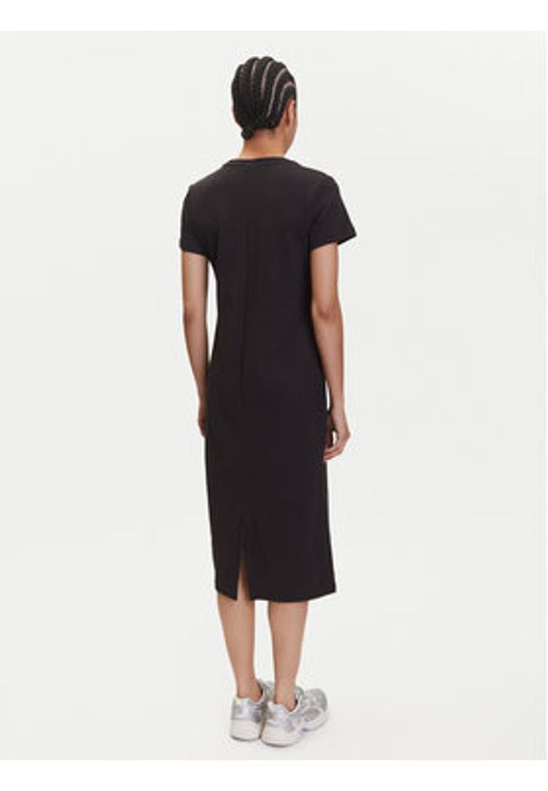 Puma Sukienka codzienna Her 685063 Czarny Regular Fit. Okazja: na co dzień. Kolor: czarny. Materiał: bawełna. Typ sukienki: proste. Styl: casual