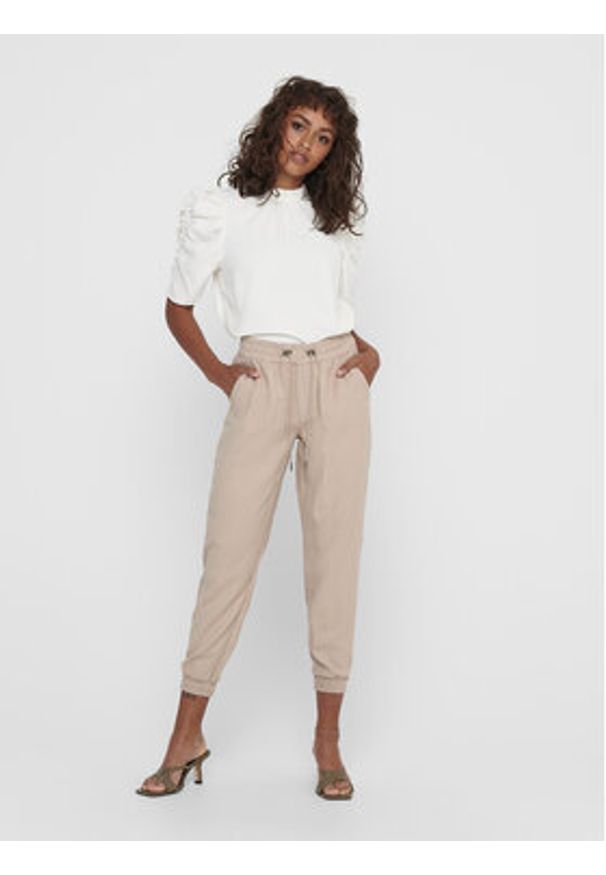 only - ONLY Spodnie dresowe 15203946 Beżowy Regular Fit. Kolor: beżowy. Materiał: wiskoza