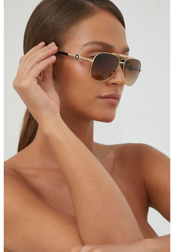 VERSACE - Versace Okulary przeciwsłoneczne damskie. Kolor: złoty