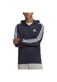 Adidas - Bluza adidas Essentials Fleece 3-Stripes Full-Zip Hoodie GK9053 - granatowa. Okazja: na co dzień, na spacer. Kolor: niebieski. Materiał: bawełna, wiskoza, poliester, materiał. Wzór: aplikacja. Styl: klasyczny, casual. Sport: turystyka piesza, kolarstwo, fitness #1