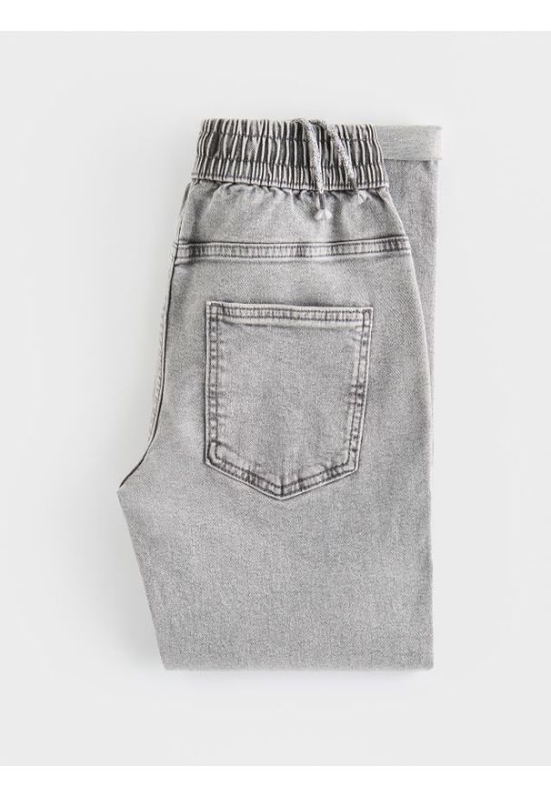 Reserved - Jeansy carrot fit - jasnoszary. Kolor: szary