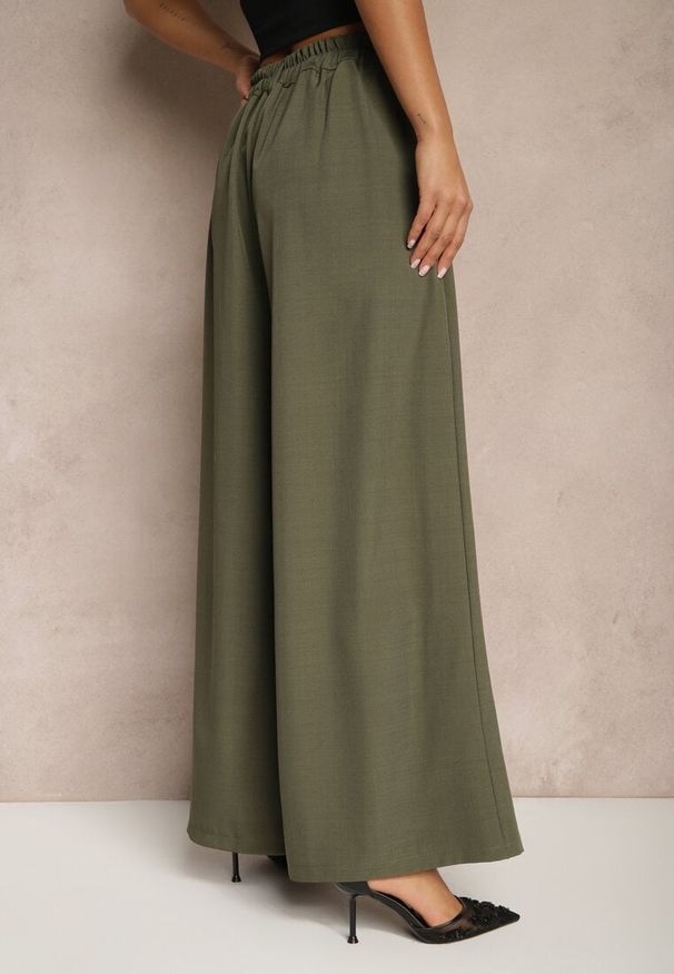 Renee - Ciemnozielone Eleganckie Spodnie Palazzo z Szerokimi Nogawkami Adivisa. Stan: podwyższony. Kolor: zielony. Styl: elegancki