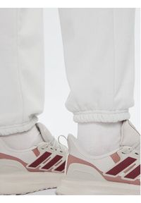 Under Armour Spodnie dresowe Ua Icon 6003676 Écru Loose Fit. Materiał: bawełna #5