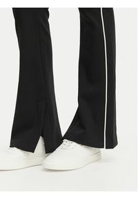 Hugo - HUGO Spodnie dresowe Niflack 50558616 Czarny Regular Fit. Kolor: czarny. Materiał: bawełna #4