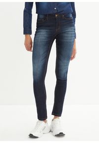 bonprix - Dżinsy ze stretchem SKINNY, mid waist. Kolor: niebieski