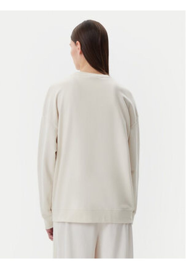 Puma Bluza Ess 685401 Beżowy Oversize. Kolor: beżowy. Materiał: bawełna, syntetyk