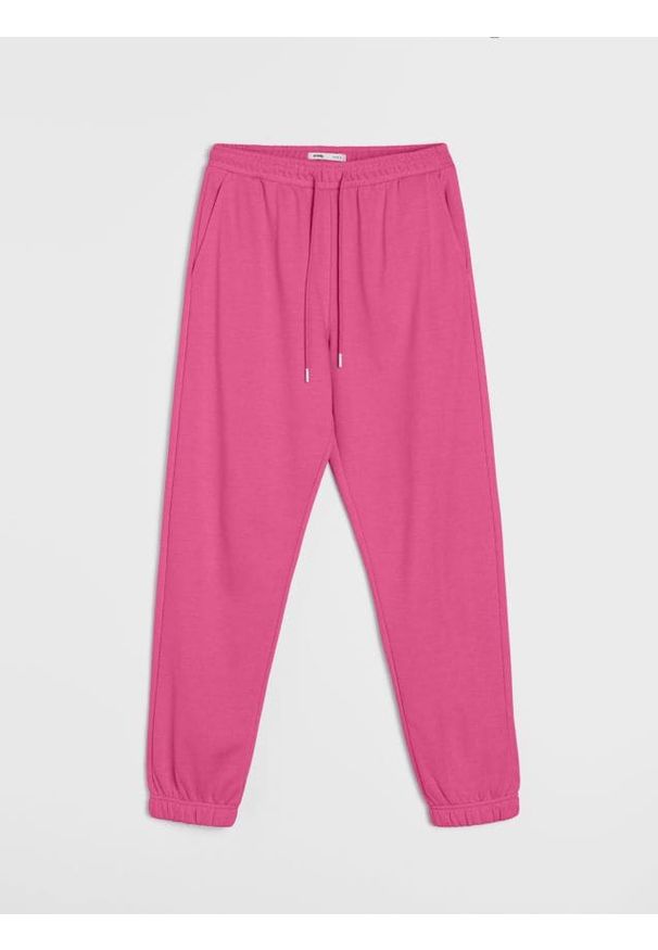 Sinsay - Dresowe spodnie jogger terry - różowy. Kolor: różowy. Materiał: dresówka