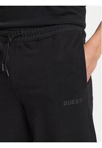 Guess Spodnie dresowe Z6GB01 K2834 Czarny Regular Fit. Kolor: czarny. Materiał: bawełna #3