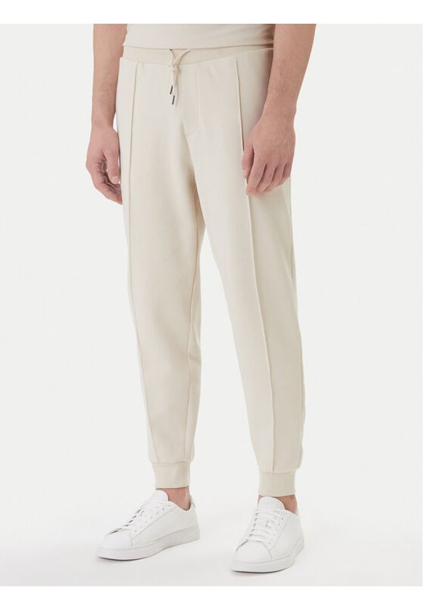 BOSS Spodnie dresowe Sense 50557197 Beżowy Regular Fit. Kolor: beżowy. Materiał: bawełna