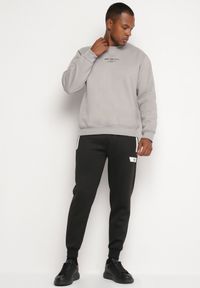 Born2be - Czarne Dresowe Spodnie z Ozdobnymi Wstawkami i Ściągaczami Riannia. Okazja: na co dzień. Kolor: czarny. Materiał: dresówka. Styl: sportowy, casual #4