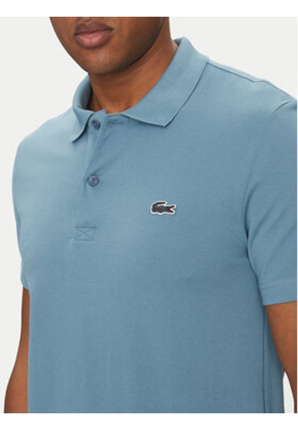 Lacoste Polo DH5522 Niebieski Regular Fit. Typ kołnierza: polo. Kolor: niebieski. Materiał: bawełna, syntetyk