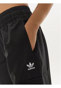 Adidas - adidas Spodnie dresowe adicolor 3-Stripes JF1292 Czarny Loose Fit. Kolor: czarny. Materiał: syntetyk #5