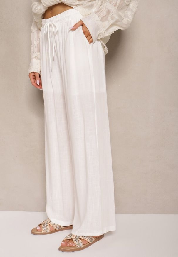 Renee - Białe Spodnie z Bawełny o Prostych Nogawkach z Gumką i Sznurkiem w Pasie Efrara. Okazja: na spacer, na randkę. Stan: podwyższony. Kolor: biały. Materiał: bawełna. Styl: elegancki
